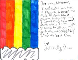 Hand written letter from student reading: "Dear Junior Achievement, I had such a fun time at JA BizTown. I learned so much. BizTown was a one in a lifetime experience! I finally realized how hard parents have it. I thank you so much for letting me go on this amazing trip! I had the best time. Sincerely, Andrea"