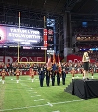 Tatum singing national anthem at sporting event
