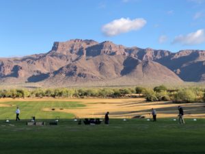 JA Open event, photo of Superstition Mountains with golfers in foreground