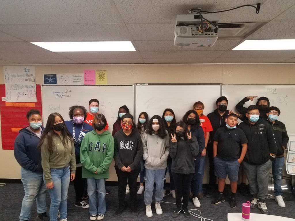 group of 7th and 8th grade students wearing masks