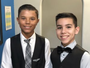 Two young boys in business attire